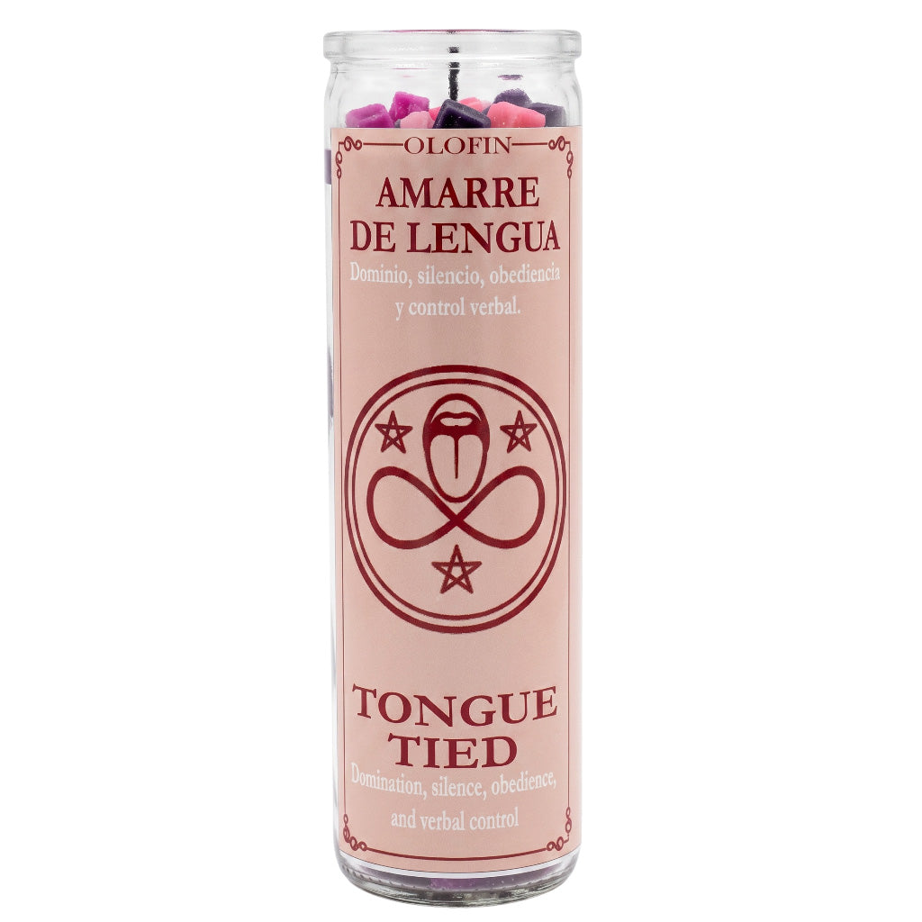 A tall glass jar candle with a pale pink label reading 'Olofin Amarre de Lengua Tongue Tied' in dark red text and symbols, filled with pink and purple wax pieces, on a white background.