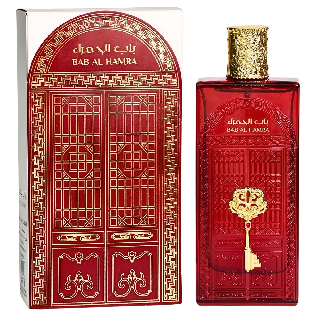 Red perfume bottle with gold accents and matching packaging on a white background