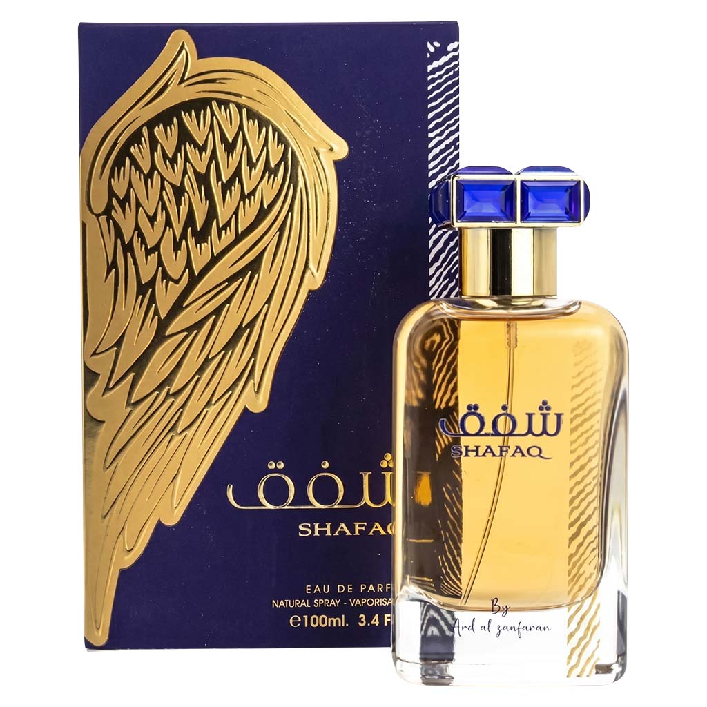 Shafaq perfume bottle with packaging featuring a gold wing design on a white background
