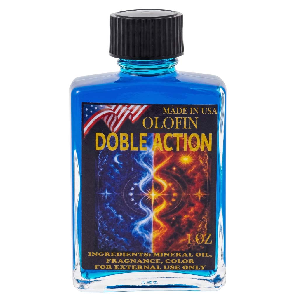 A 1 oz bottle of Olofin Doble Action fragrance oil. The bottle is made of transparent blue-tinted glass with a black ribbed cap and a colorful label depicting a split cosmic design in blue and orange.