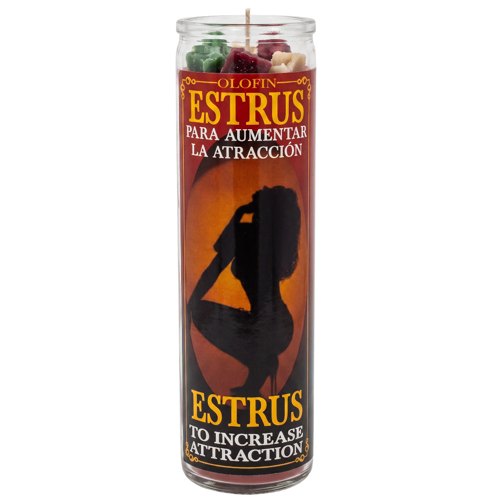A tall glass prayer candle with a printed label reading 'Olofin Estrus Para Aumentar La Atraccion' and 'Estrus To Increase Attraction,' featuring a black silhouette on an orange-brown background. Wax pieces are visible at the top of the clear container against a plain white studio background.