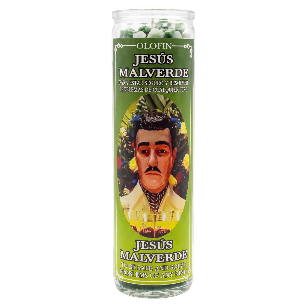 A tall glass jar candle with a green label featuring a portrait of Jesús Malverde. The candle contains white and green wax pieces visible at the top, and the label reads 'OLOFIN JESÚS MALVERDE'.