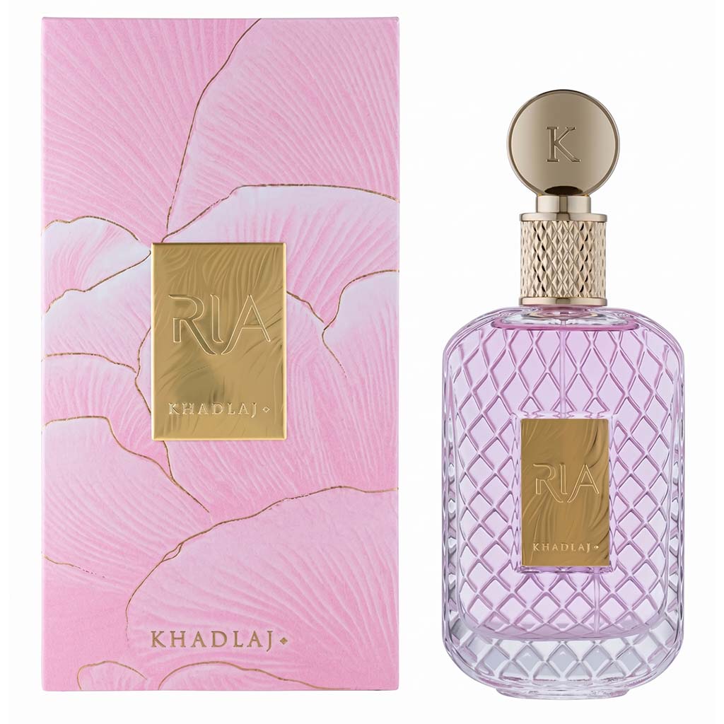 Perfume bottle and packaging with 'RIA KHADLAJ' branding on a white background
