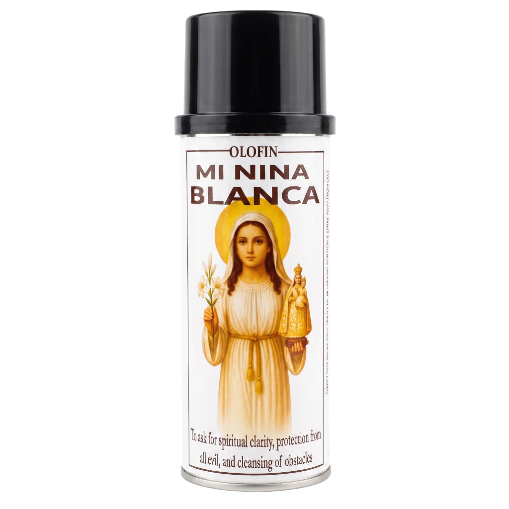 A can of Olofin Mi Nina Blanca spray, featuring a white label with an illustration of the Virgin Mary in a gold halo and a silver metal base, set against a plain white background.
