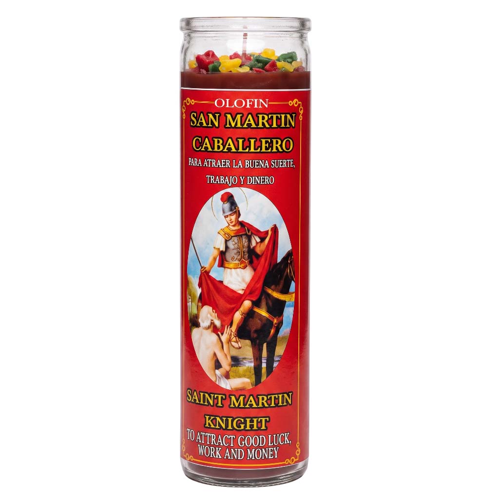 A tall glass jar candle labeled 'Olofin San Martin Caballero' featuring a red label with a Saint Martin knight illustration and multicolored wax pieces visible at the top, on a white background.