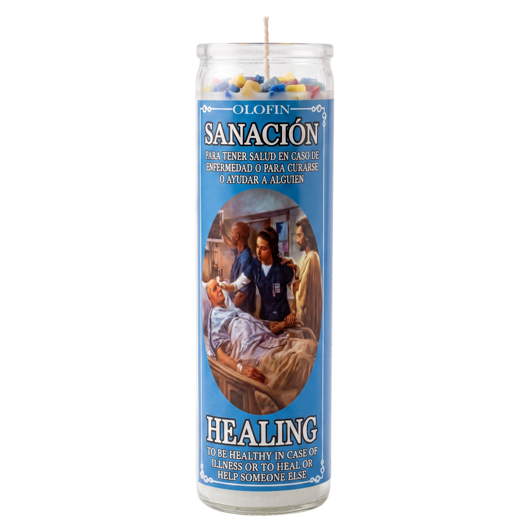 A tall glass prayer candle with a blue label reading 'OLOFIN SANACIÓN HEALING' and a photo of people around a sick person, shown on a plain white background.