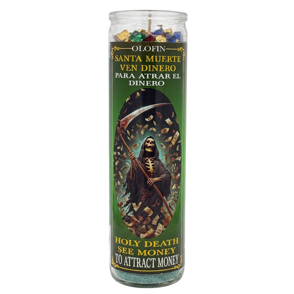 A tall glass prayer candle with a green label featuring an illustration of the Grim Reaper holding a scythe, surrounded by gold coins. The label has Spanish text at the top and English text at the bottom reading 'Holy Death See Money' and 'To Attract Money.