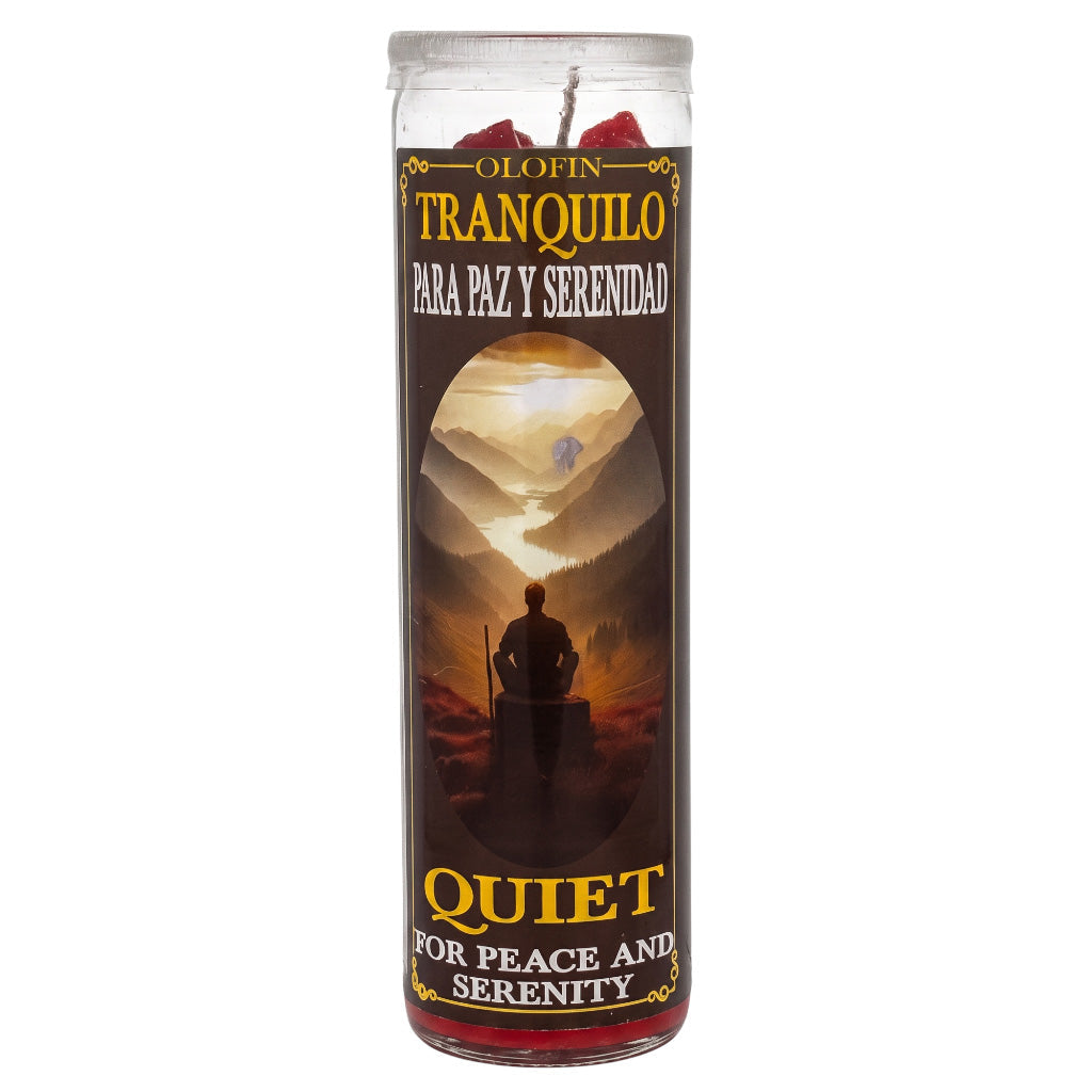 A tall glass jar candle with a clear lid and a dark brown label featuring the Spanish text 'Olofin Tranquilo Para Paz Y Serenidad' and 'Quiet For Peace And Serenity' in gold lettering, with an illustration of a person standing in a mountain landscape.