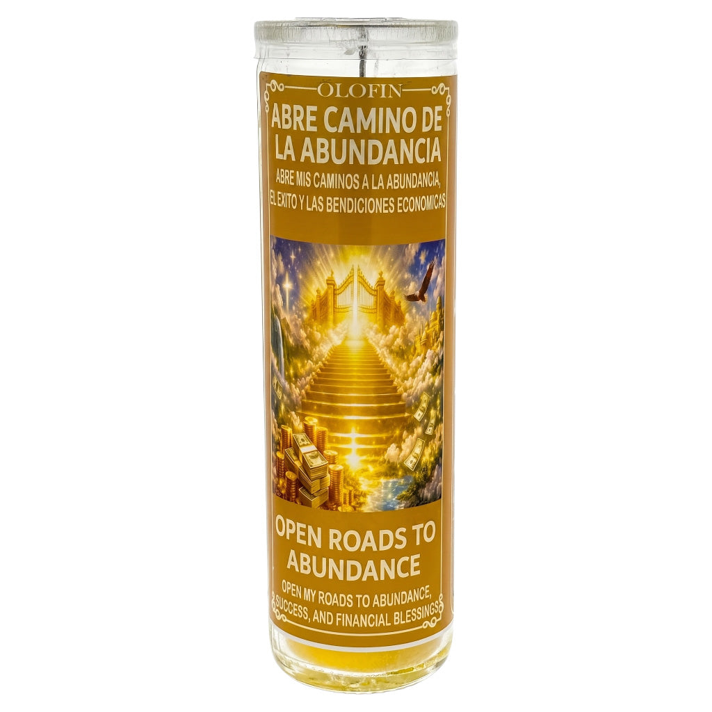 A tall glass prayer candle with a clear lid and a golden label reading 'Olofin' and 'Abre Camino de la Abundancia' with an illustration of a glowing staircase, on a white background.