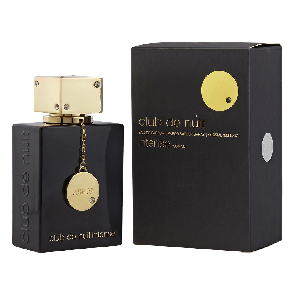 Black and gold 'club de nuit intense' perfume bottle and packaging on a white background