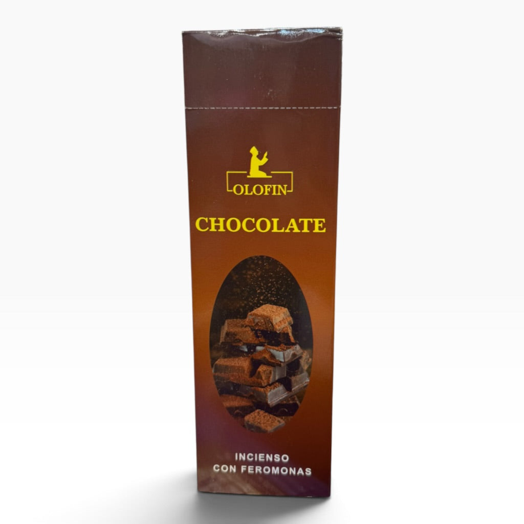 A tall, narrow brown box of Olofin Chocolate incienso con feromonas, featuring a gold logo and a photo of chocolate pieces on the front, set against a plain white background.