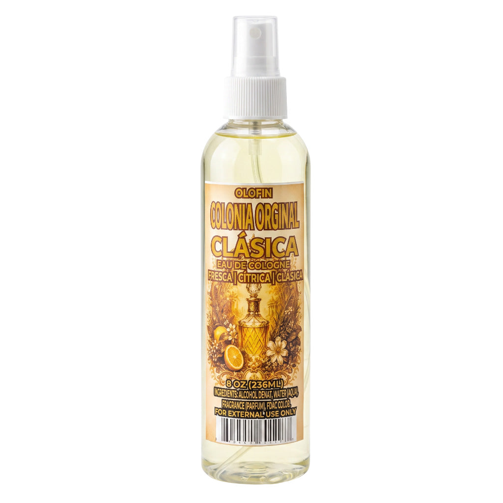 A clear plastic spray bottle of Clafin Colonia Original Clásica Eau de Toilette, filled with a pale yellow liquid, featuring a white spray nozzle and a detailed golden-yellow label with illustrations of a perfume bottle, flowers, and citrus slices.