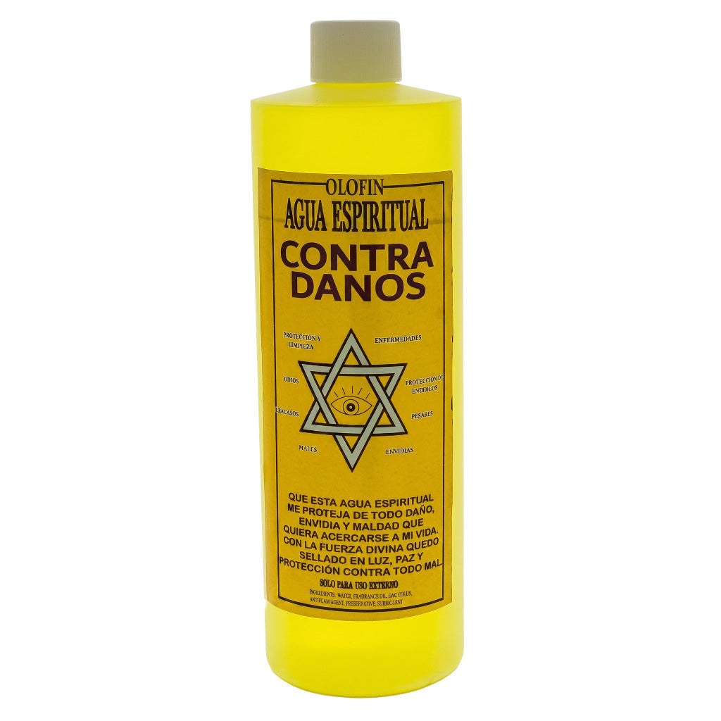 A translucent yellow bottle of Olofin Agua Espiritual 'Contra Danos' spiritual protection liquid, featuring a yellow label with black text and a Star of David design, on a white background.