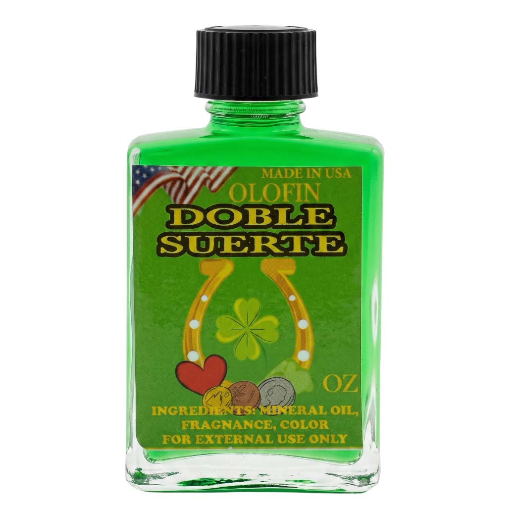 A green glass bottle of Olofin Doble Suerte general oil with a black cap, featuring a green label with gold lettering and luck symbols.
