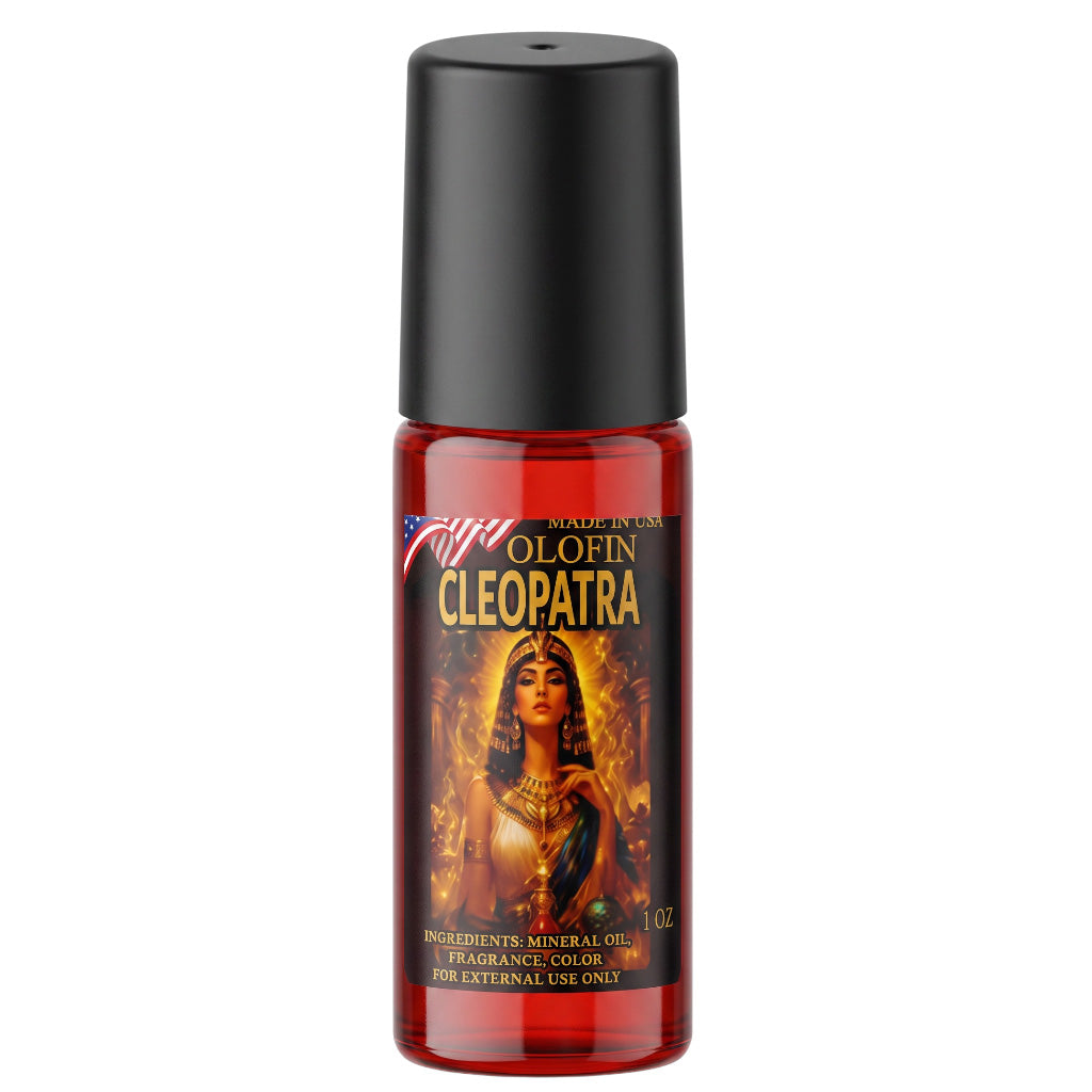 A 1 oz bottle of Fifi's Olfin Cleopatra fragrance mineral oil. The bottle is made of translucent red plastic showing the dark liquid inside, topped with a matte black cap.