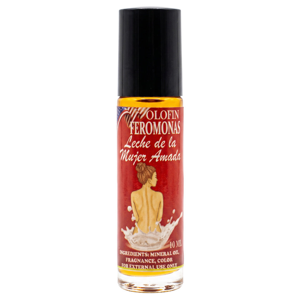 A 40 ml bottle of Colofin Feromonas 'Leche de la Mujer Amada' fragrance oil. The bottle has a black cap, a clear glass body showing the golden liquid inside, and a red label featuring a back view illustration of a woman and Spanish text.