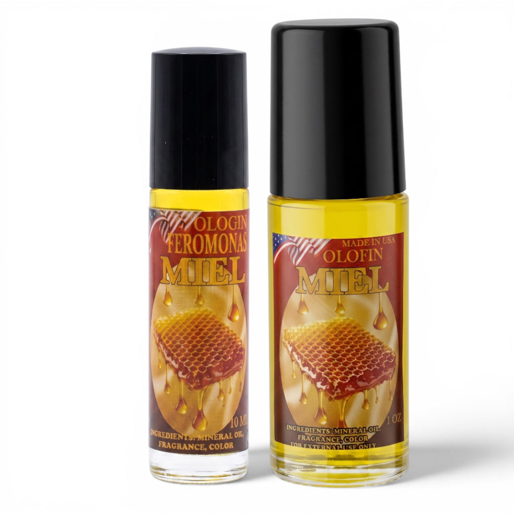 Two small roll-on fragrance bottles labeled 'Olofin Aeromonas Miel' with black caps, shown on a plain white background. The bottles contain yellow liquid and feature a honeycomb and honey drop graphic on the label.