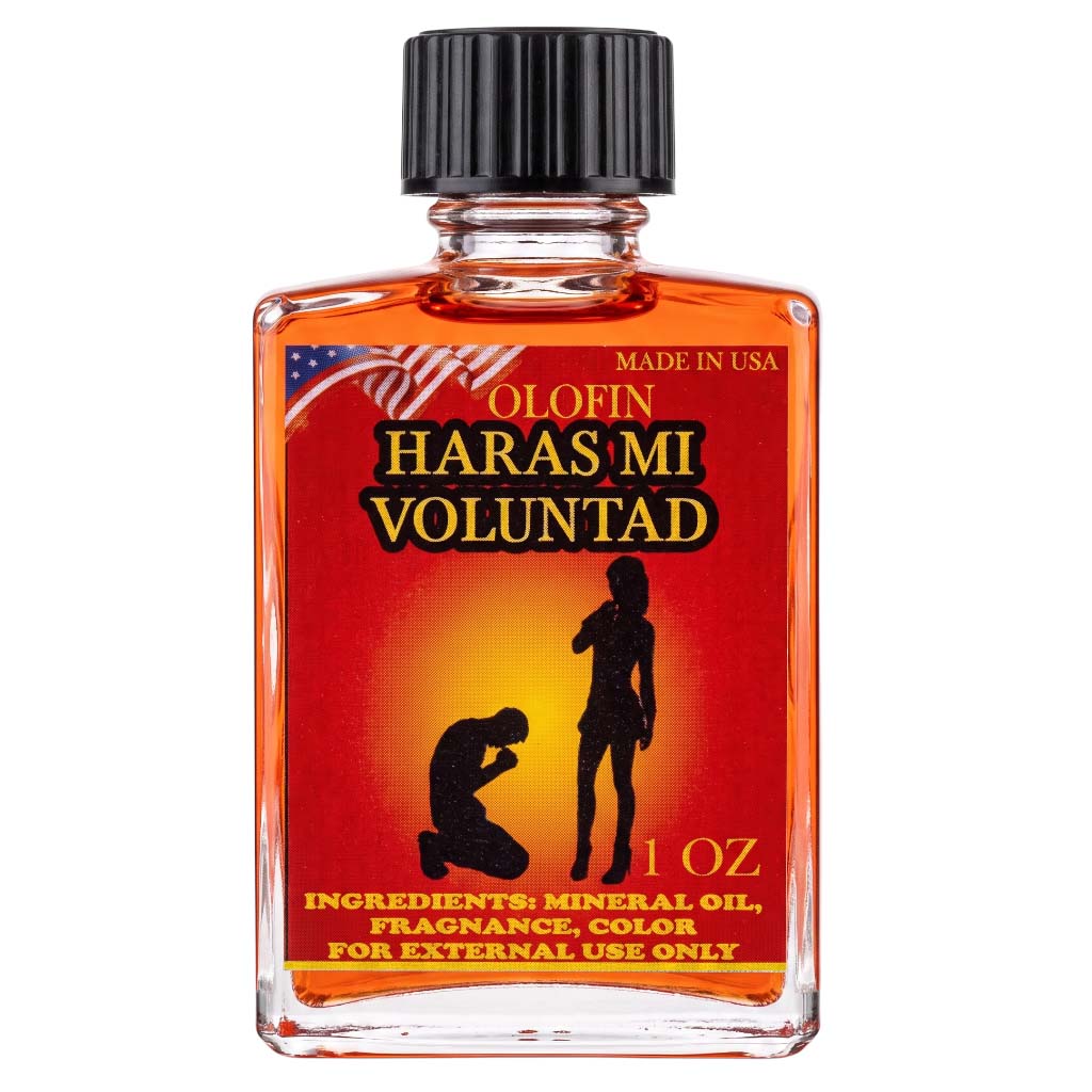 A 1 oz glass bottle of Olofin Haras Mi Voluntad fragrance oil with a black cap, filled with amber-colored liquid and featuring a red and orange label with black silhouettes.