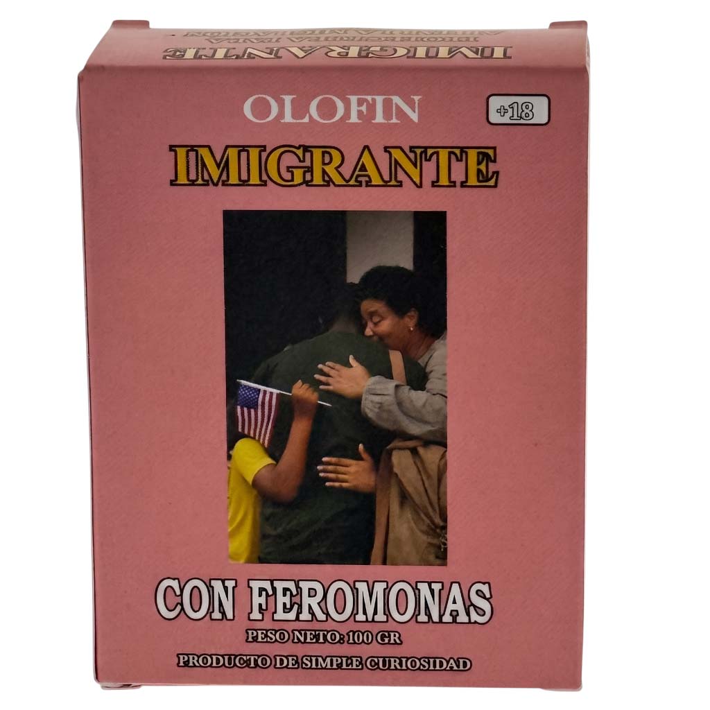 A pink rectangular box of Olofin Migrante con feromonas, featuring a central photo of a family embrace and Spanish text on a white background.