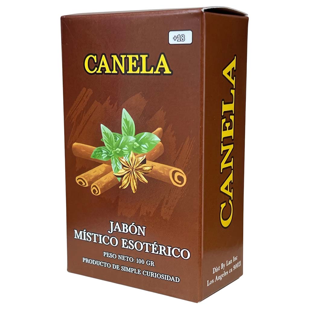 Box of 'Canela' with cinnamon sticks and star anise on a brown background