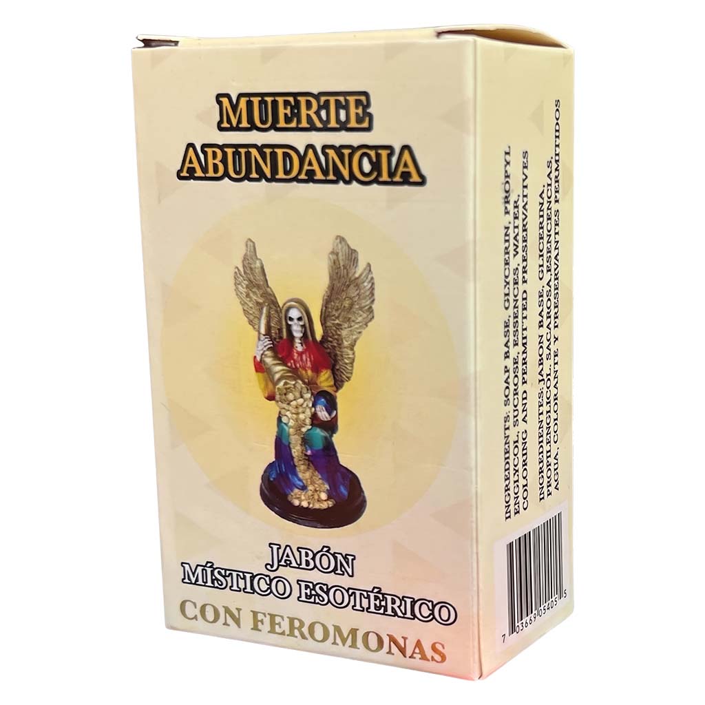 Box of 'Muerte Abundancia' with a figurine on a beige background