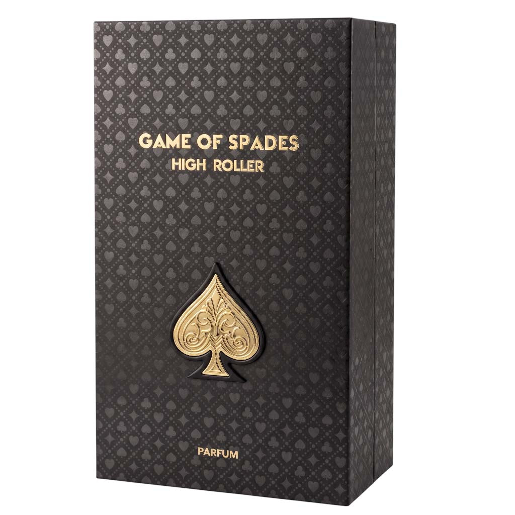 A rectangular perfume box for 'Game of Spades High Roller' with a dark textured pattern and metallic gold lettering and spade emblem, shown on a plain white background.