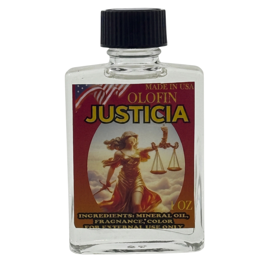A clear glass bottle of Olofin Justicia fragrance oil with a black cap and a red label featuring Lady Justice.