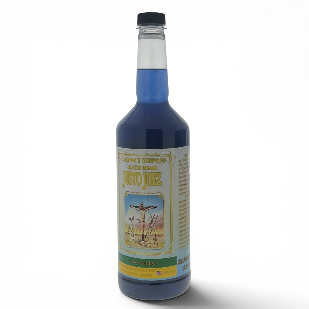 A bottle of Justo Juez Mate Hijo blue coffee syrup with a black cap and a cream-colored label featuring a religious illustration, set against a plain white background.