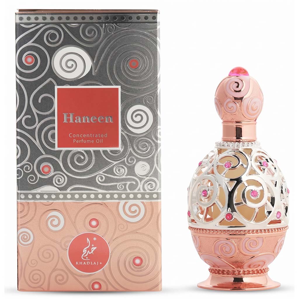 Perfume bottle and packaging with 'Haneen' branding on a white background