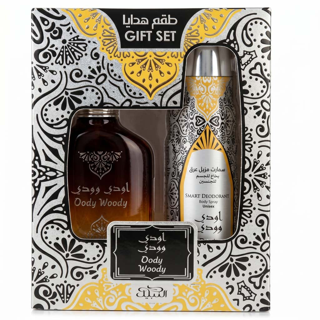 Gift set with bottles labeled 'Oody Woody' in a decorative box with black and yellow patterns.