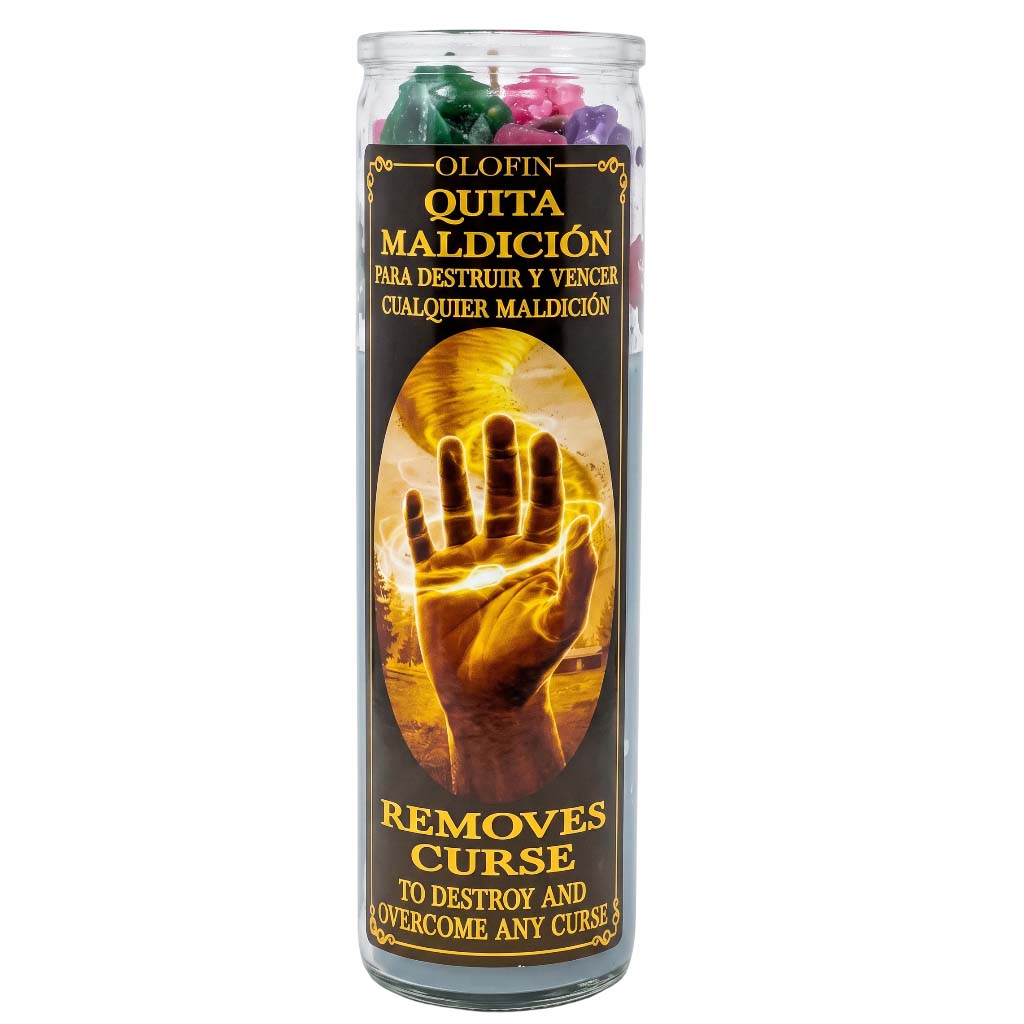 A tall clear glass jar candle with a black label featuring a glowing hand graphic and Spanish text reading 'Olofin Quita Maldición' and 'Removes Curse,' with multicolored wax pieces visible at the top.