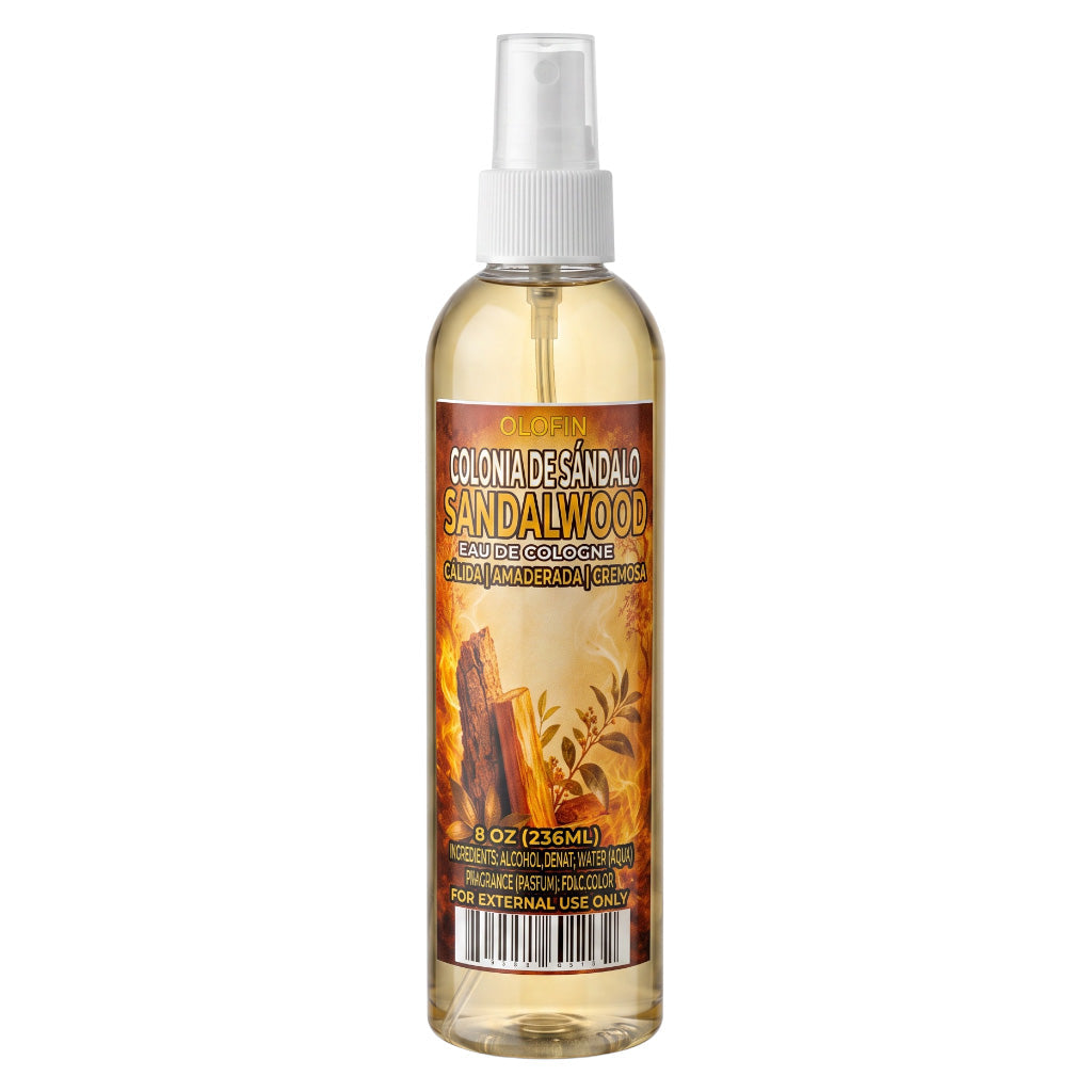 A 8 oz spray bottle of Colon Desandalo Sandalwood Natural Pajamero and Cleanser, featuring a white spray nozzle and a label with warm orange, brown, and yellow sandalwood wood grain illustrations.