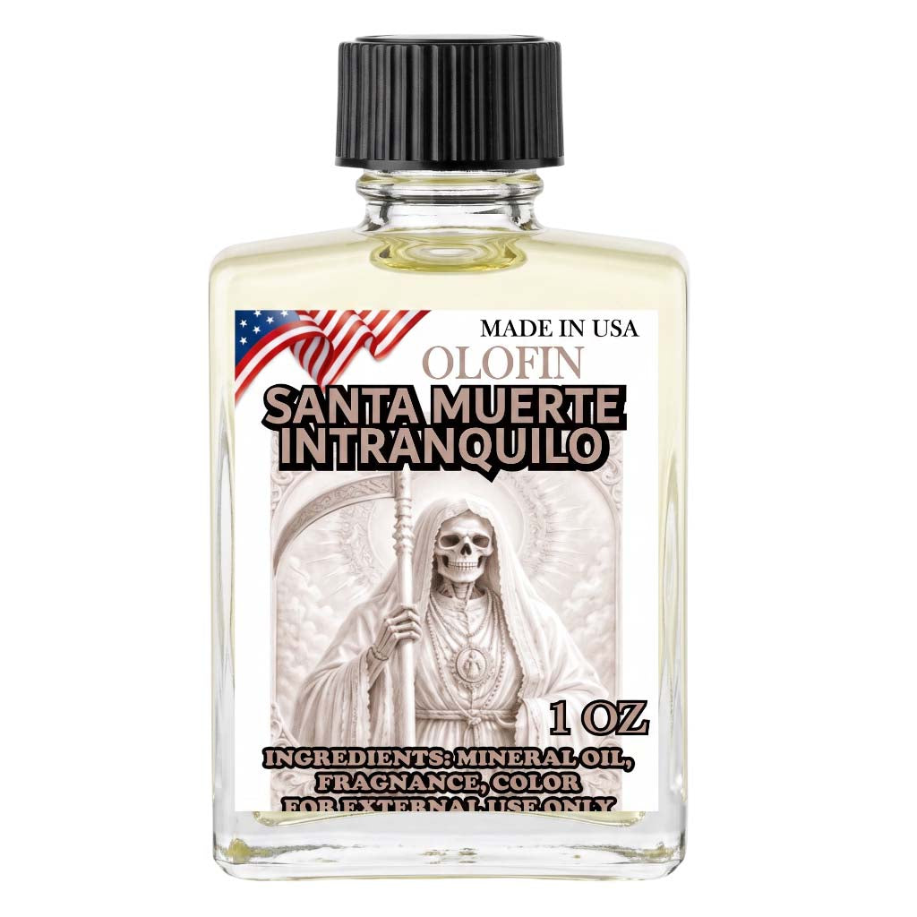 A 1 oz clear glass bottle of Olofin Santa Muerte Intranquilo fragrance oil with a black ribbed cap and a detailed front label featuring a skeleton saint illustration and an American flag.